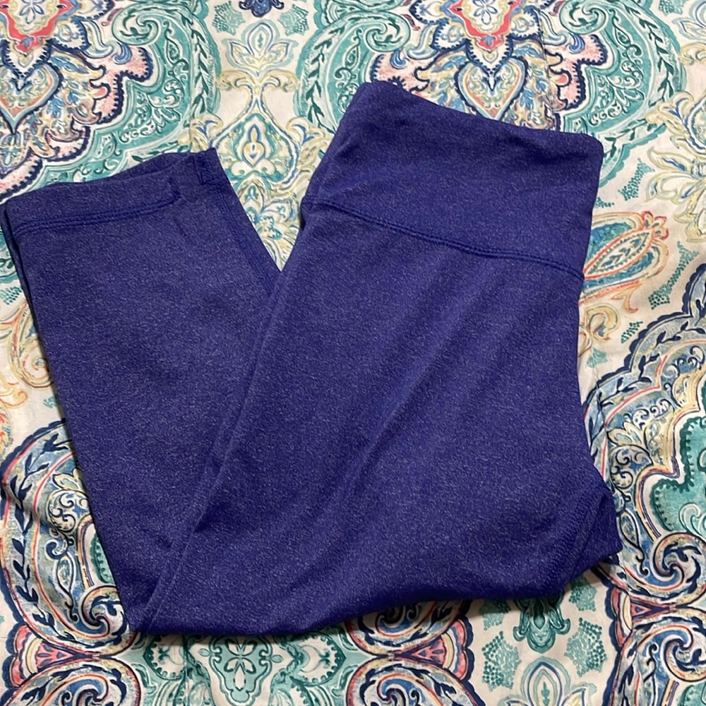 Rebook purple capri leggings.